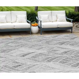 Photo of Gray Charcoal And Ivory Geometric Washable Indoor Outdoor Area Rug