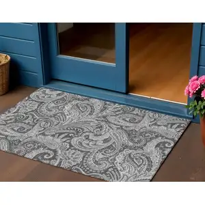 Photo of Gray Charcoal And Ivory Paisley Washable Indoor Outdoor Area Rug