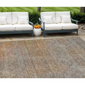 Photo of Gray Charcoal And Orange Abstract Washable Indoor Outdoor Area Rug