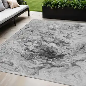 Photo of Gray Charcoal And Silver Abstract Washable Indoor Outdoor Area Rug