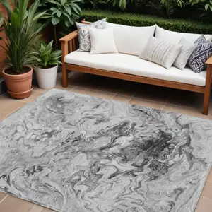 Photo of Gray Charcoal And Silver Abstract Washable Indoor Outdoor Area Rug