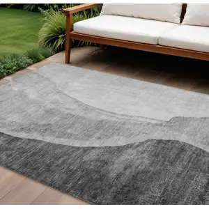 Photo of Gray Charcoal And Silver Abstract Washable Indoor Outdoor Area Rug