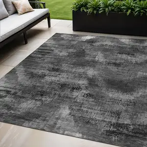 Photo of Gray Charcoal And Silver Abstract Washable Indoor Outdoor Area Rug