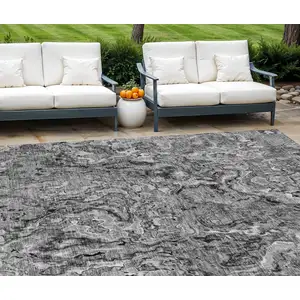 Photo of Gray Charcoal And Silver Abstract Washable Indoor Outdoor Area Rug