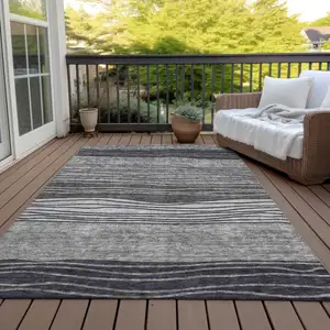 Photo of Gray Charcoal And Silver Striped Washable Indoor Outdoor Area Rug