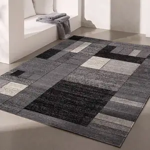 Photo of Gray Distressed Geometric Area Rug