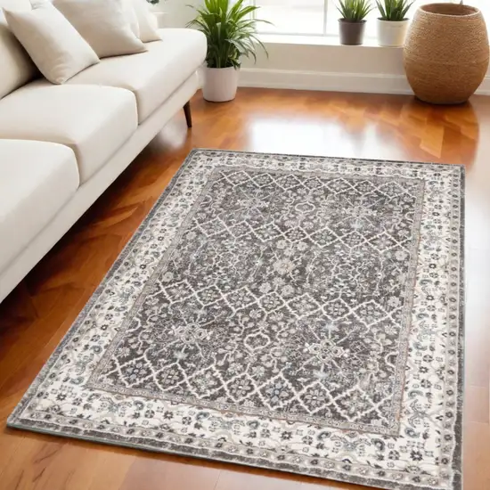 Gray Floral Power Loom Area Rug Photo 1