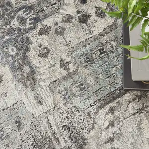 Photo of Gray Floral Power Loom Distressed Area Rug