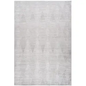 Photo of Gray Geometric Distressed Area Rug