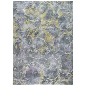 Photo of Gray Gold Abstract Rings Area Rug