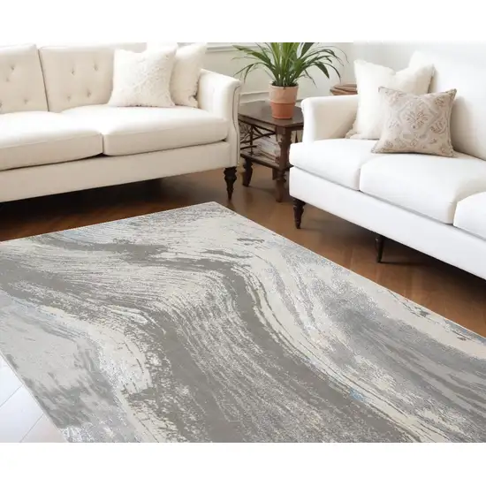 Gray Ivory And Blue Abstract Stain Resistant Area Rug Photo 1