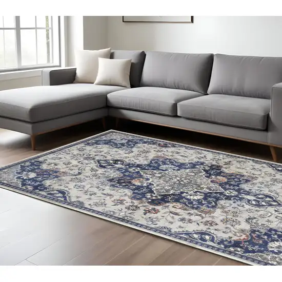 Blue and Ivory Floral Power Loom Distressed Non Skid Area Rug Photo 1