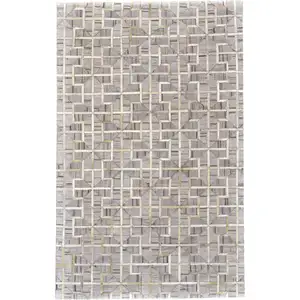 Photo of Gray Ivory And Brown Geometric Hand Woven Area Rug