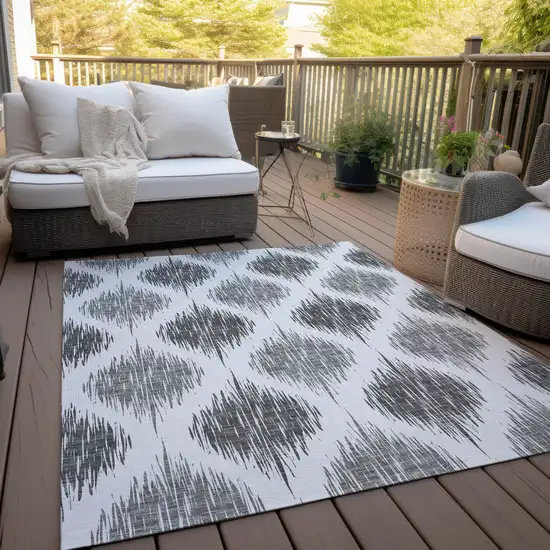 Gray Ivory And Charcoal Ikat Washable Indoor Outdoor Area Rug Photo 8