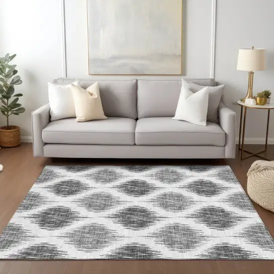 Gray Ivory And Charcoal Ikat Washable Indoor Outdoor Area Rug Photo 9