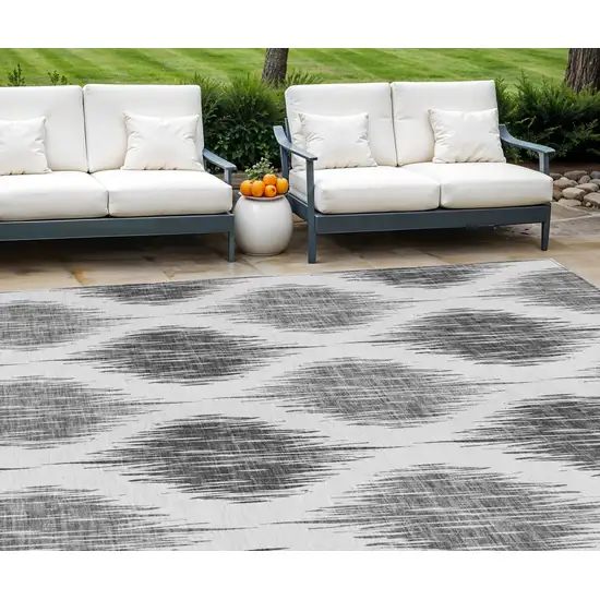 Gray Ivory And Charcoal Ikat Washable Indoor Outdoor Area Rug Photo 1