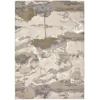 Photo of Gray Ivory And Gold Abstract Area Rug