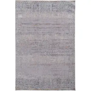 Photo of Gray Ivory And Orange Geometric Power Loom Distressed Stain Resistant Area Rug