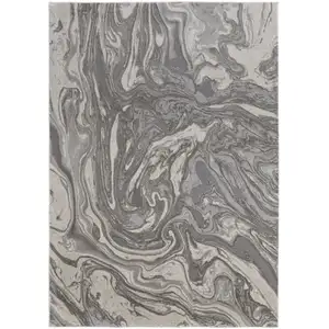 Photo of Gray Ivory And Silver Abstract Stain Resistant Area Rug