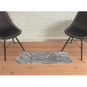 Photo of Gray Ivory And Silver Abstract Stain Resistant Area Rug