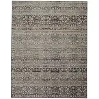 Photo of Gray Ivory And Tan Abstract Distressed Area Rug With Fringe