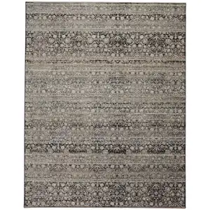 Photo of Gray Ivory And Tan Abstract Distressed Area Rug With Fringe