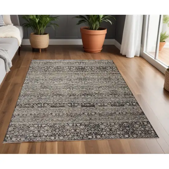 Gray Ivory And Tan Abstract Distressed Area Rug With Fringe Photo 1