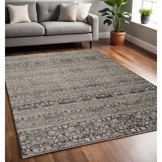 Gray and Ivory Abstract Distressed Area Rug With Fringe Photo 1