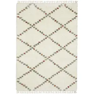 Photo of Gray Ivory And Tan Diamond Shag Area Rug With Fringe