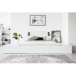 Photo of Gray Ivory And Taupe Abstract Distressed Area Rug With Fringe