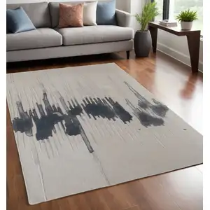 Photo of Gray Ivory and Blue Abstract Hand Tufted Area Rug