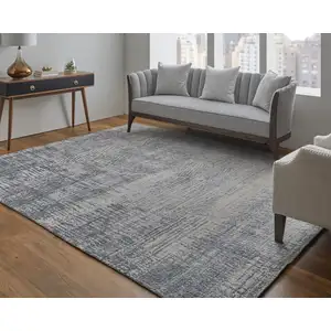 Photo of Gray Ivory and Blue Abstract Hand Woven Worn Faded Area Rug