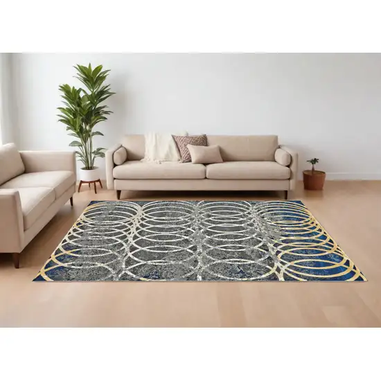 Gray Ivory and Blue Geometric Power Loom Worn Faded Area Rug Photo 1