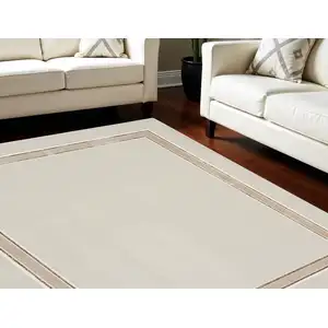 Photo of Gray Ivory and Cream Geometric Non Skid Area Rug