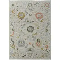 Photo of Gray Ivory and Gold Wool Floral Hand Knotted Area Rug With Fringe