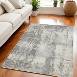 Photo of Gray Ivory and Light Blue Abstract Non Skid Area Rug