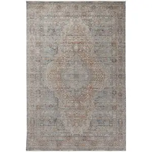 Photo of Gray Ivory and Orange Oriental Power Loom Worn Faded Area Rug With Fringe