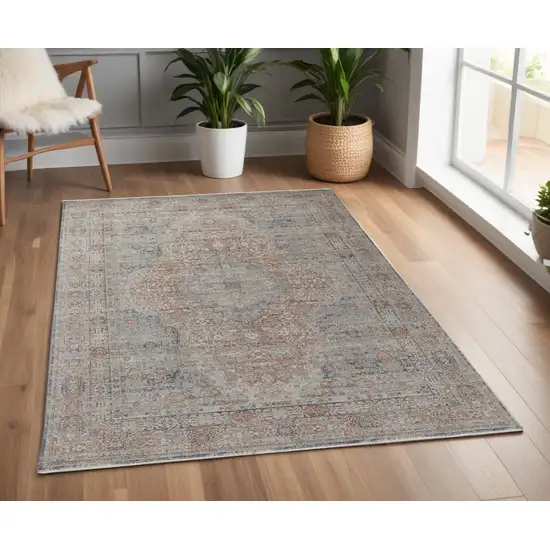 Gray Ivory and Orange Oriental Power Loom Worn Faded Area Rug With Fringe Photo 1