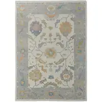 Photo of Gray Ivory and Orange Wool Floral Hand Knotted Area Rug With Fringe