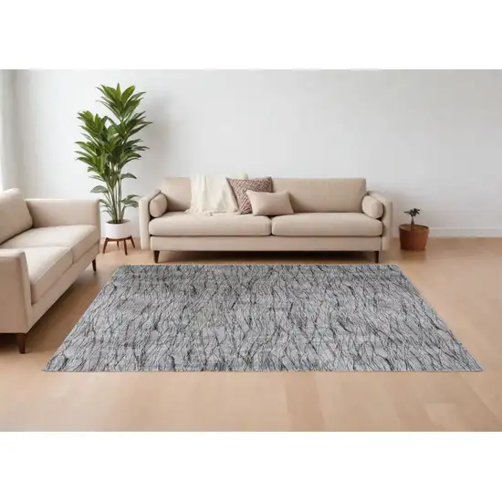 Gray Ivory and Tan Abstract Power Loom Area Rug Photo 1