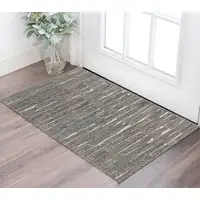 Photo of Gray Ivory and Taupe Abstract Hand Woven Area Rug