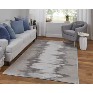 Photo of Gray Ivory and Taupe Abstract Power Loom Area Rug