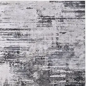 Photo of Gray Ivory and Taupe Abstract Power Loom Worn Faded Area Rug