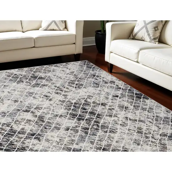 Gray Ivory and Taupe Geometric Power Loom Worn Faded Area Rug Photo 1