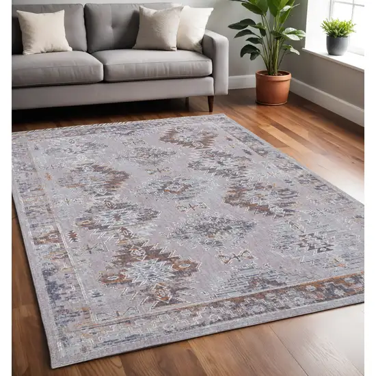 Blue and Gray Geometric Power Loom Distressed Area Rug Photo 1