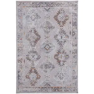 Photo of Gray Orange And Blue Geometric Power Loom Distressed Stain Resistant Area Rug