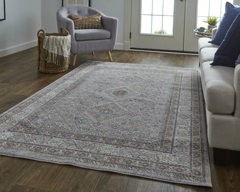 Gray Orange And Ivory Floral Power Loom Stain Resistant Area Rug Photo 1