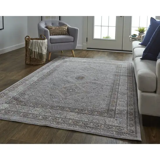 Gray Orange And Ivory Floral Power Loom Stain Resistant Area Rug Photo 1