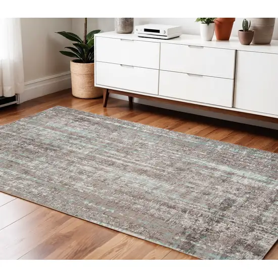 Ivory and Gray Abstract Power Loom Area Rug Photo 1