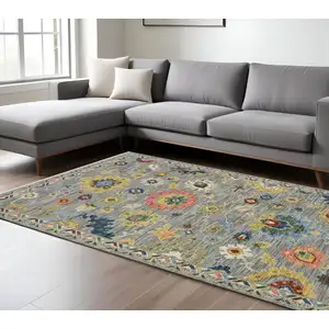 Photo of Gray Salmon And Yellow Oriental Area Rug With Fringe